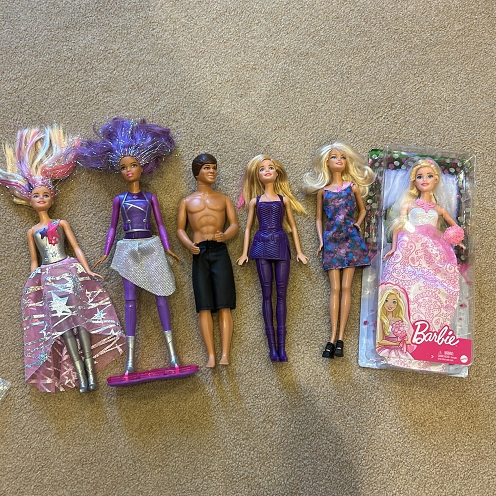 Barbies and Ken play dolls lot, all bundled together